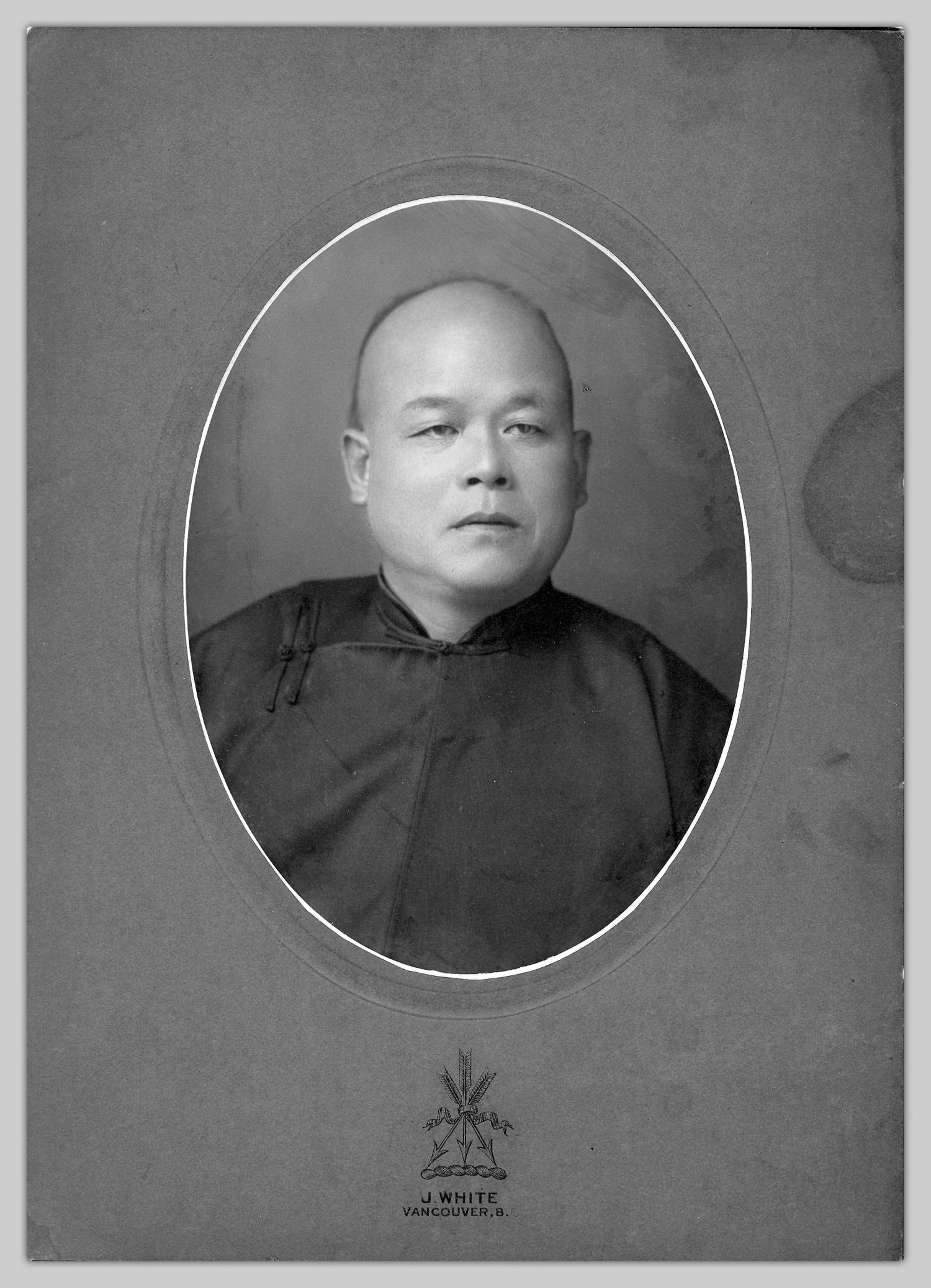 Black and white portrait of Yip Sang.
