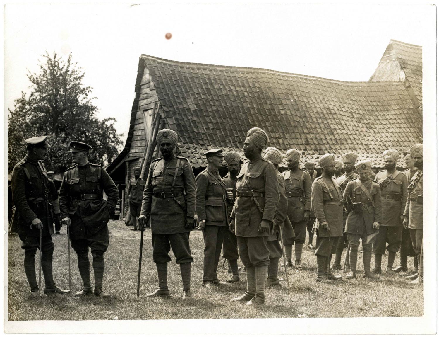 Group of British & Indian officers, 15th Sikhs [Le Sart, France]. Photographer: H. D. Girdwood.