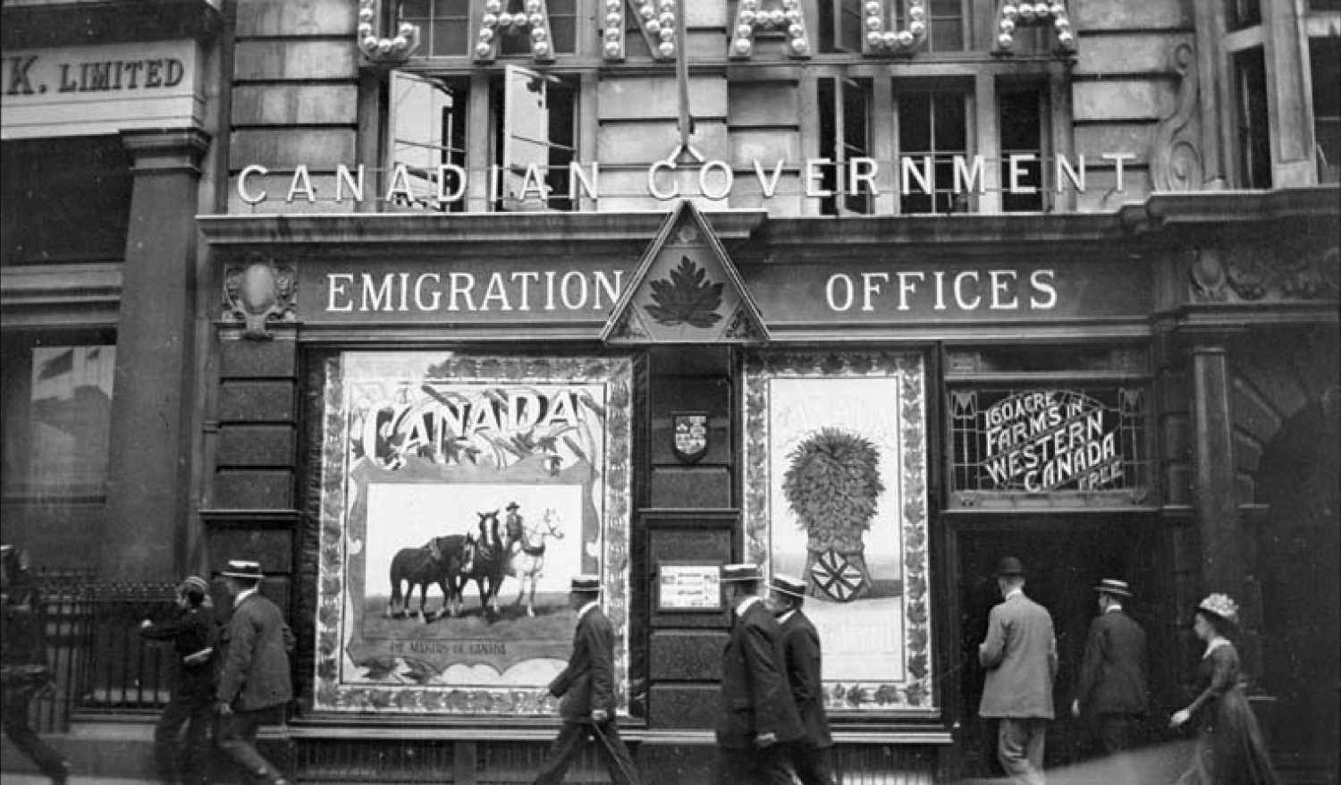 Messrs. Krag & Dawson entering Canadian Emigration Offices, 11-12 Charing Cross, London, England.