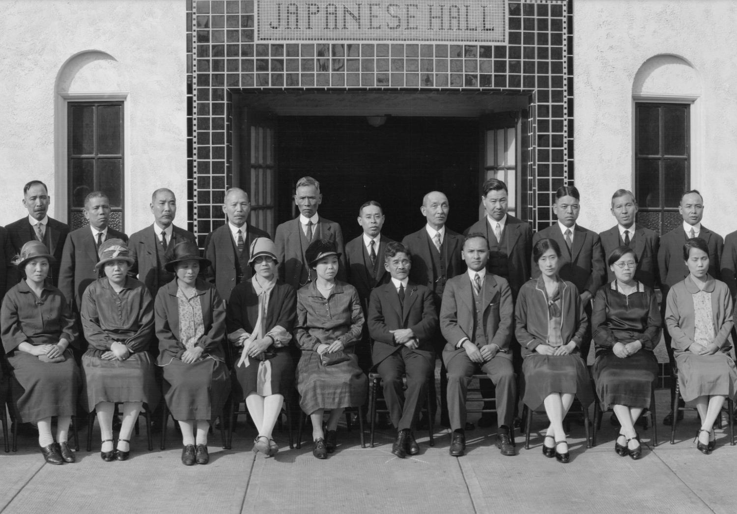 Large group of older Japanese School students outside the Japanese Hall in Japantown.