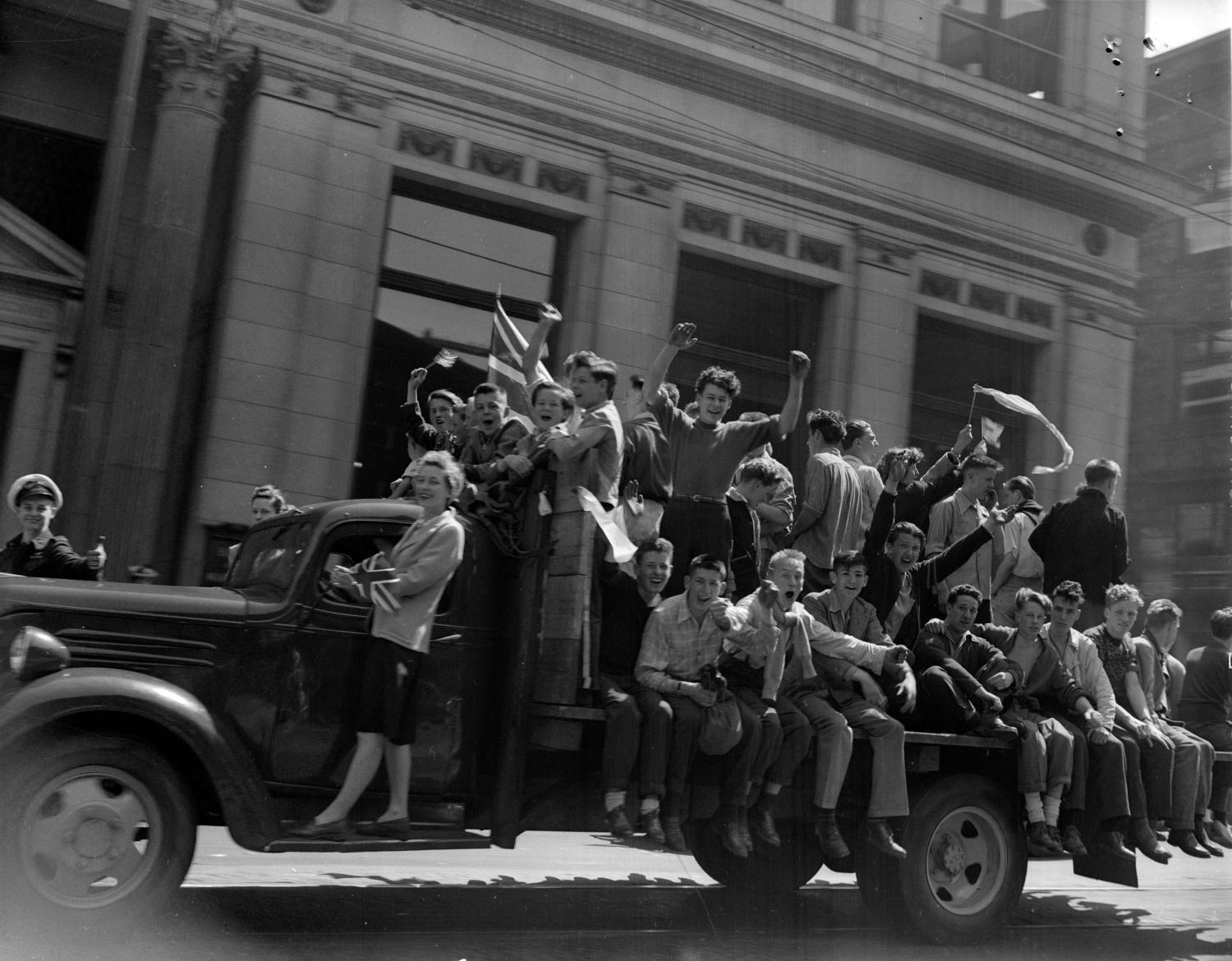 Young people in Vancouver on a truck celebrating VE-Day.