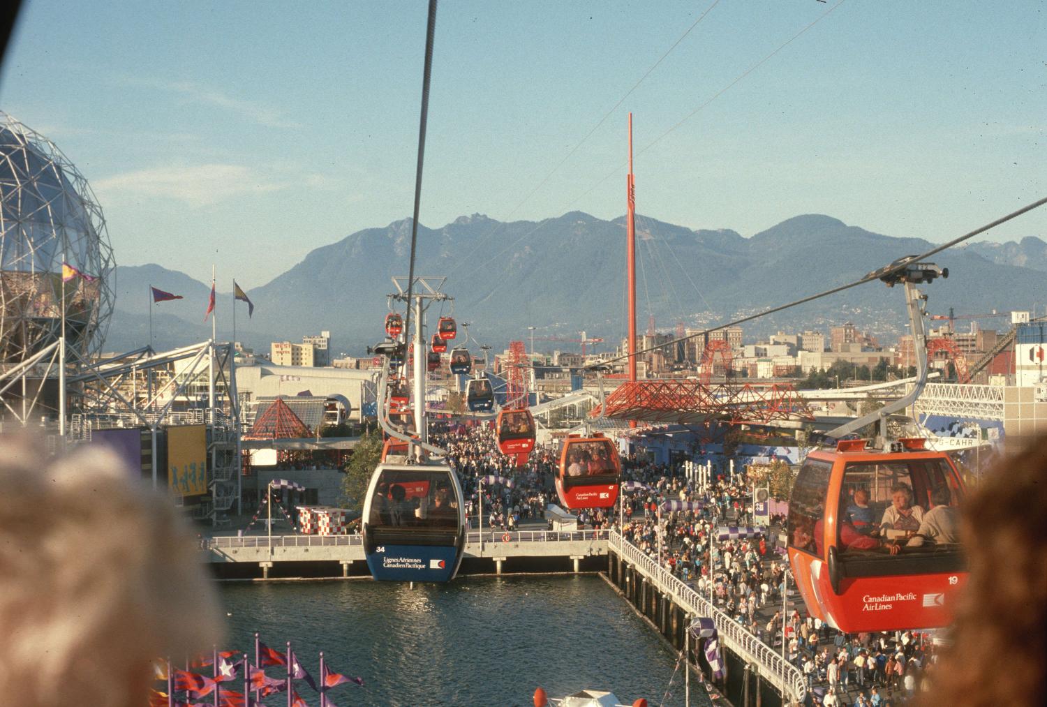 Gondolas hanging over False Creek during Expo 86.