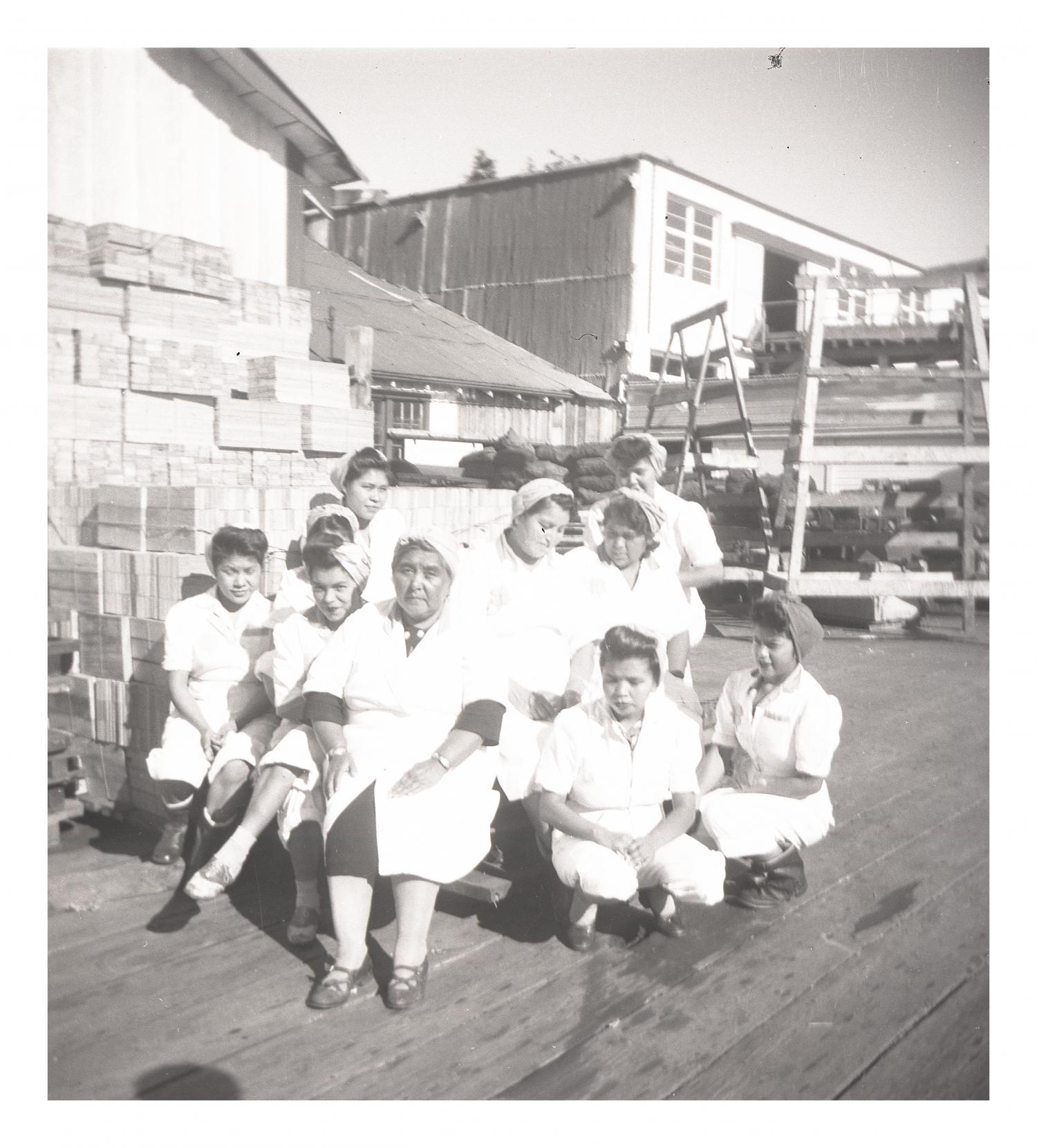 Cannery workers. Brenda Campbell is in the second row behind the lady in the center on the right side looking down. This picture was taken in 1948 in Namu BC. It was part of the Helen Moysiuk collection.