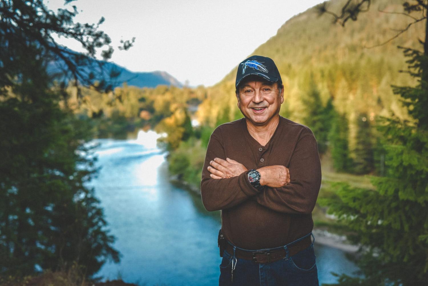 Rick Desautel stands above the Slocan River or Słuʔqín̓, which means “speared in the head,” referring to the Sinixt practice of spearing salmon. Desautel is pictured near the area where he shot an elk in 2010, spurring a lengthy legal battle to determ