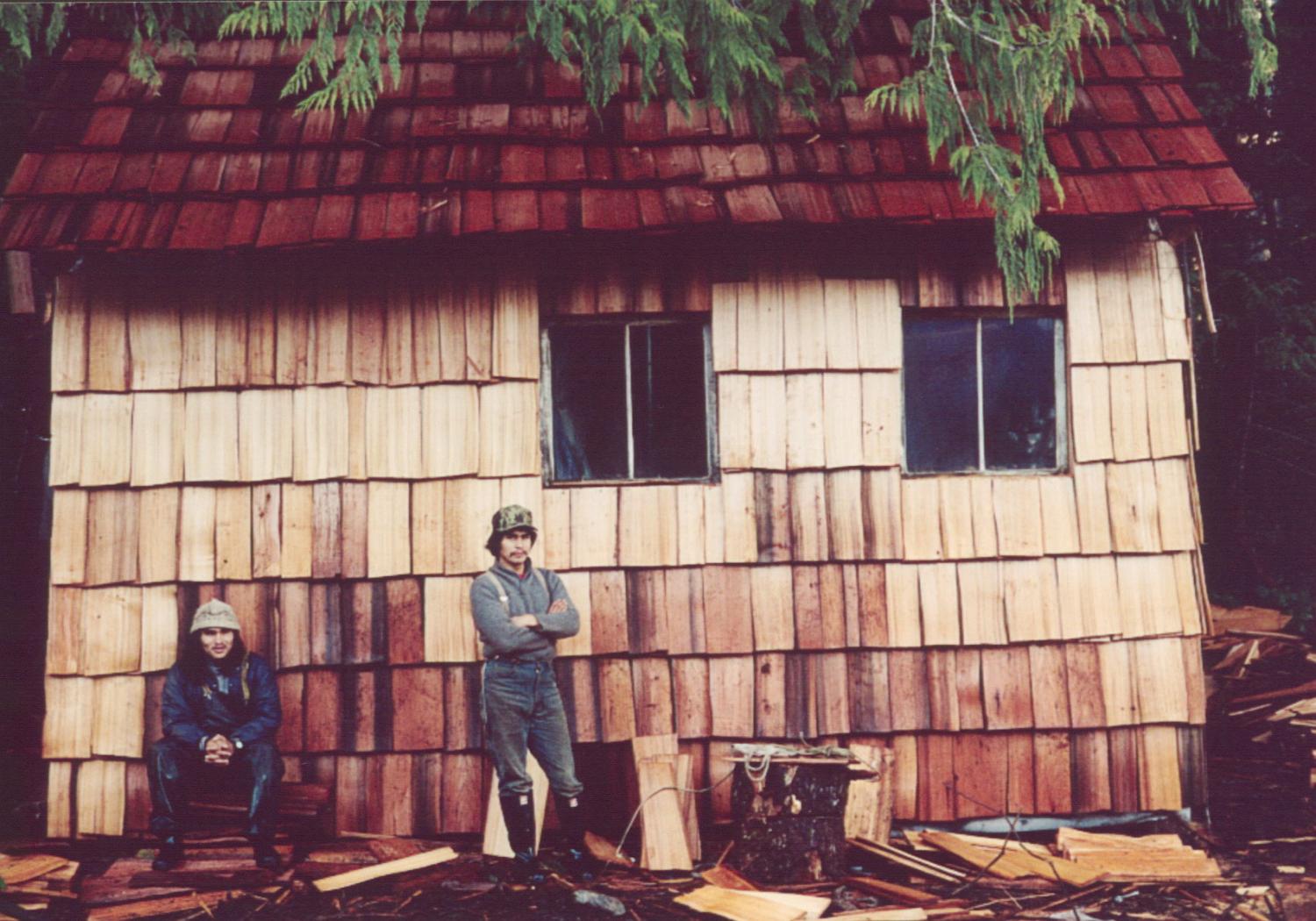 Joe and Carl Martin at the protector cabin on Wah-Nah-Jus Hilth-hoo-is (Meares Island) in the mid-1980s, a base of resistance to old-growth clear cutting on the island.