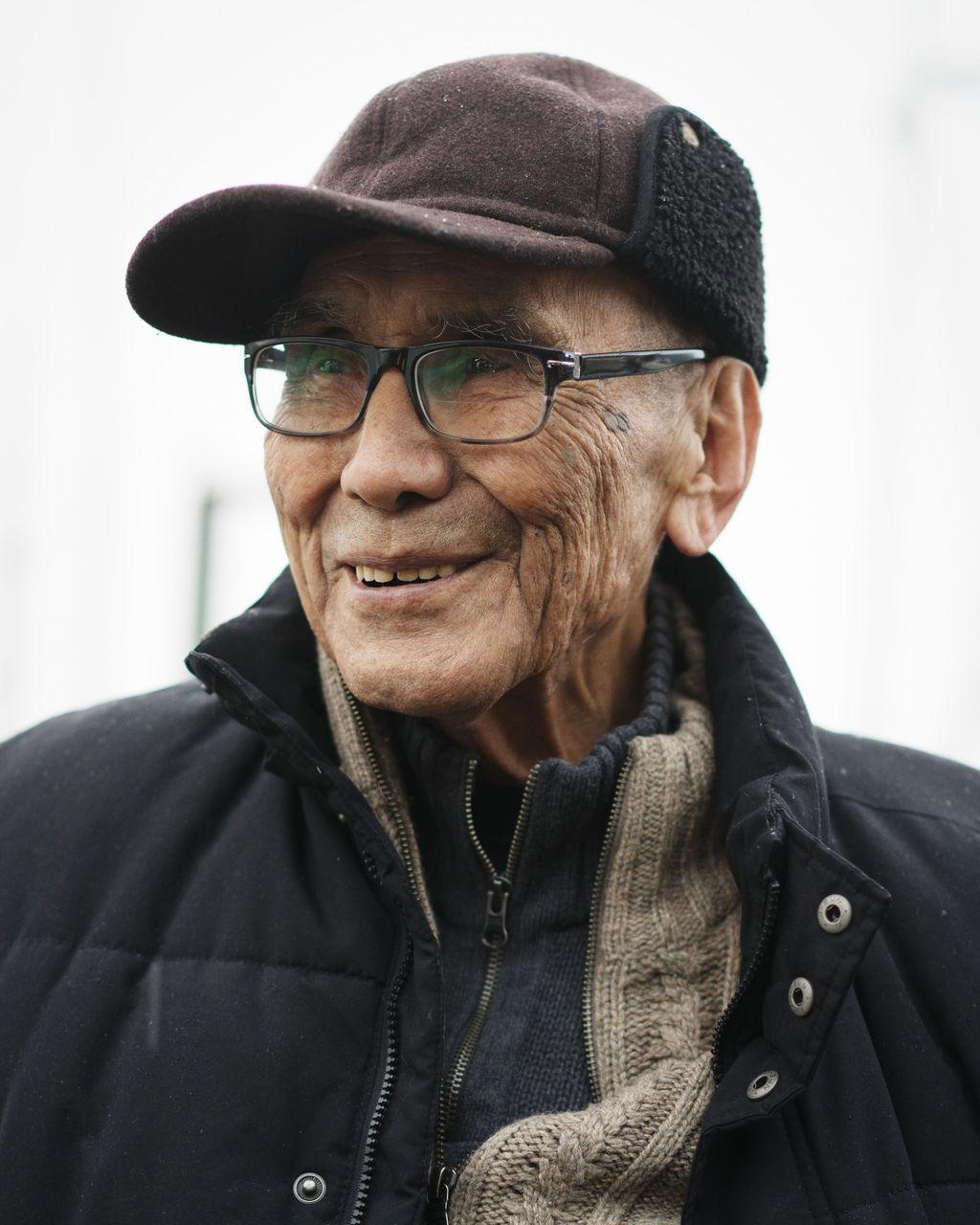 An elderly Cecil Paul smiling.