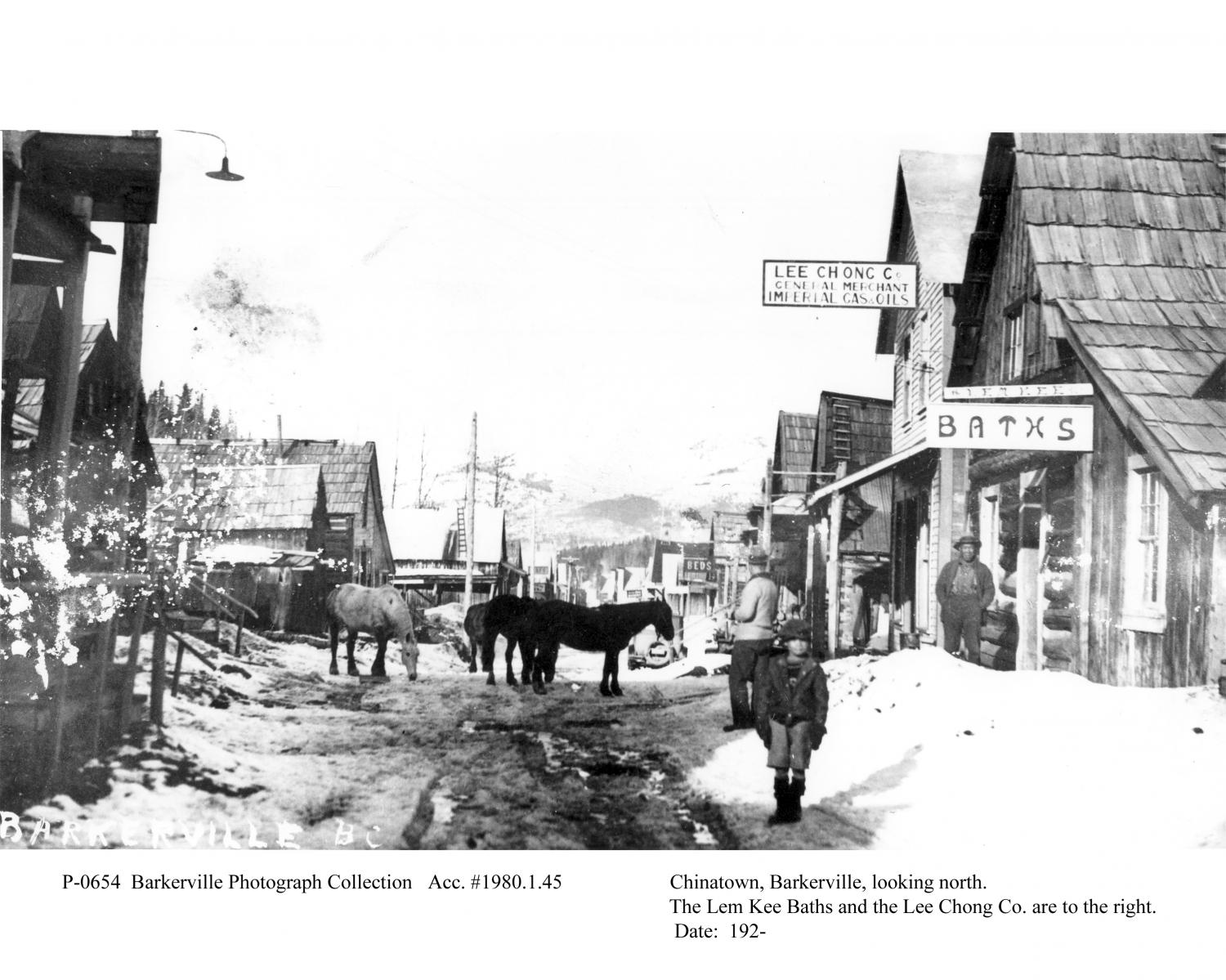 Black and white photo of Chinatown in Barkerville during winter, circa 1933.