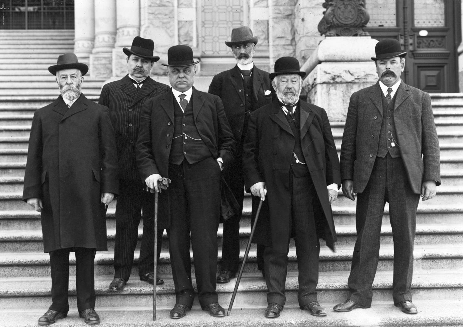 Members of the Indian Land Commission on the steps of the Legislative Buildings in Victoria in 1913.