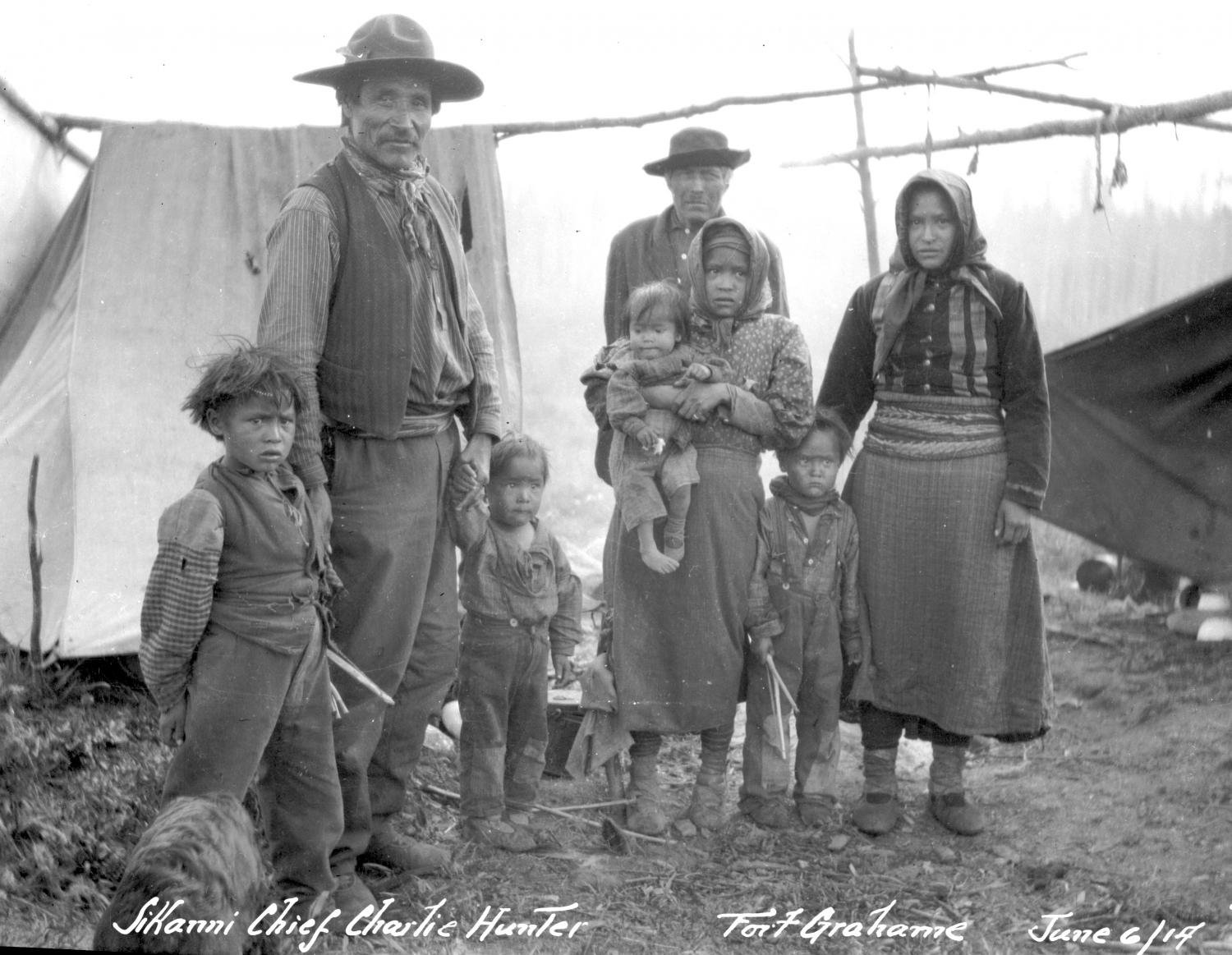 Sikanni [Sekani] Chief Charlie Hunter and family at Fort Grahame.